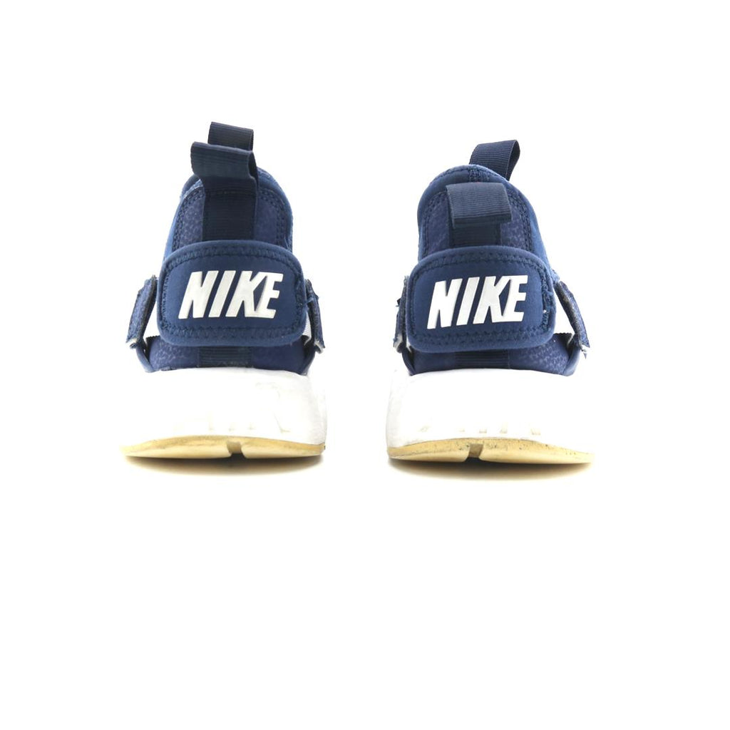 NIKE  AIR HUARACHE CITY LOW